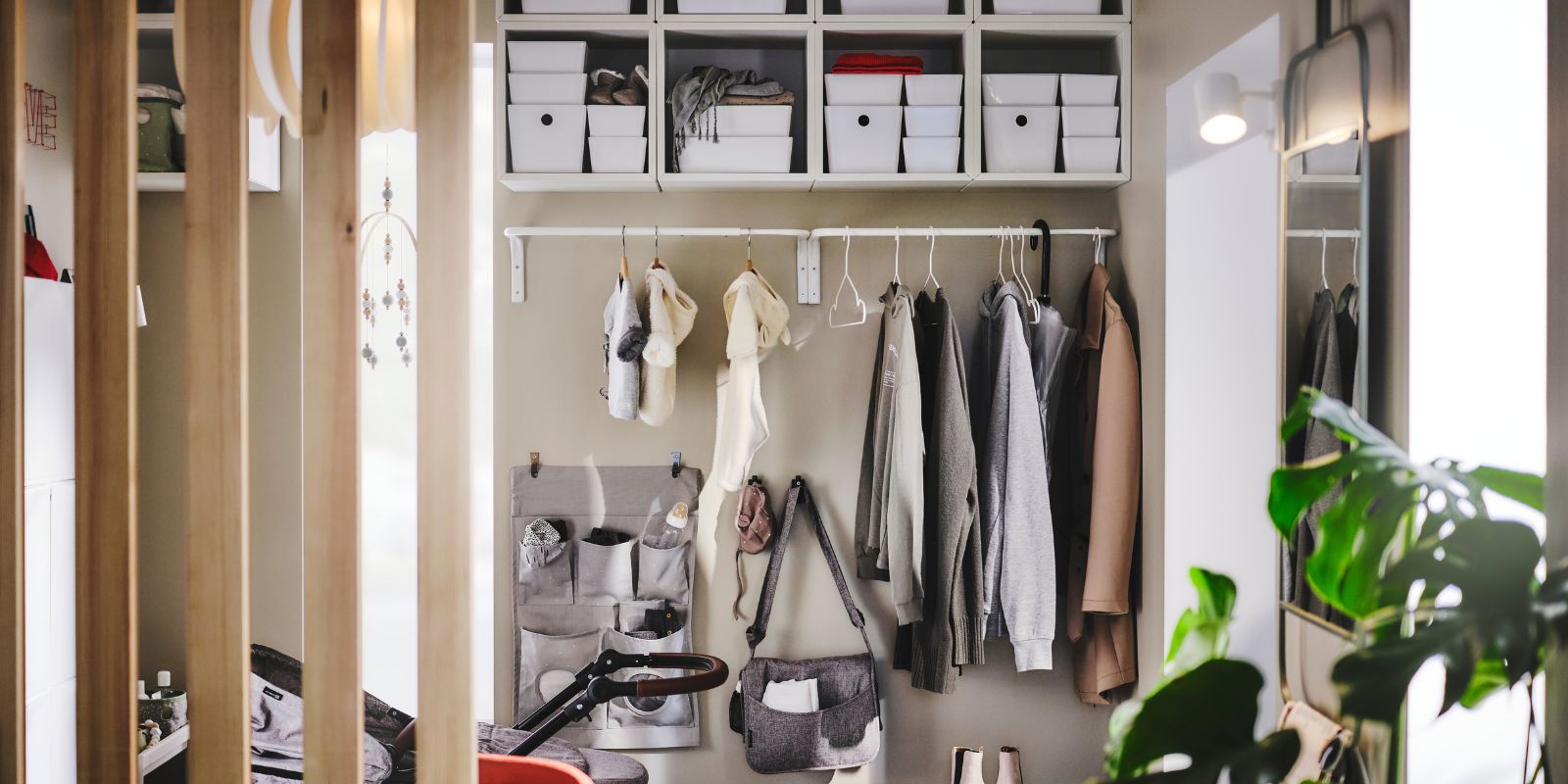 Sleek storage wall that opens up space and keeps shoes and outdoor gear tidy.