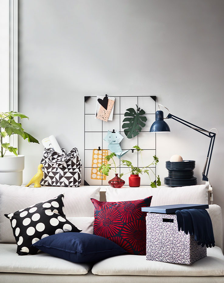 Sectional, 4-seat with chaise, Gunnared beige in the corner of the room.