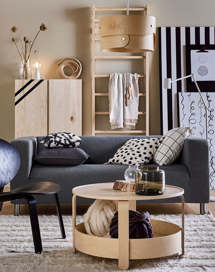 Klippan furniture in shades of gray with a wood grain finish. 