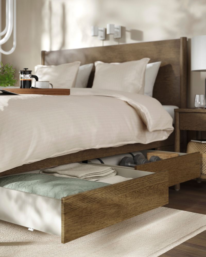 Warm bedroom with TONSTAD queen bed, NATTJASMIN duvet set, TONSTAD nightstand, NYMÅNE reading lamp and ENGELSBORG rug.